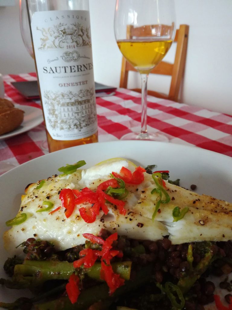 Low Fat Warm Lentil Salad with a fillet of pan-seared sea bass served with A glass of BORDEAUX CLASSIQUE SAUTERNES, GINESTET