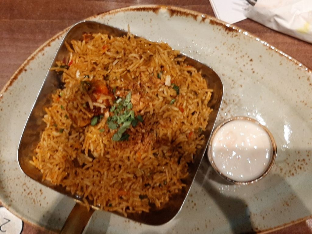 Chicken Biryani  – A beautifully aromatic dish of basmati rice cooked with boneless chicken, a boiled egg, and traditional South Indian spices.