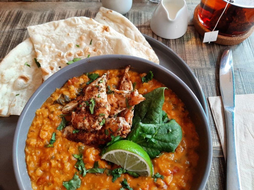 HQ Urban Kitchen: Dahl with Cajun Chicken—a spicy and comforting favourite.