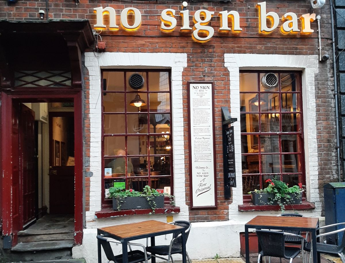 No Sign Wine Bar Swansea offers a historic setting, cosy atmosphere, and classic Sunday lunch with slow-roasted beef and homemade desserts.