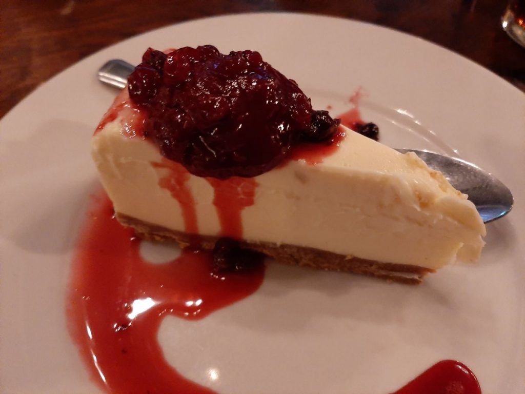 White Chocolate Cheesecake with Mixed Fruit Compote at No Sign Wine Bar Swansea 